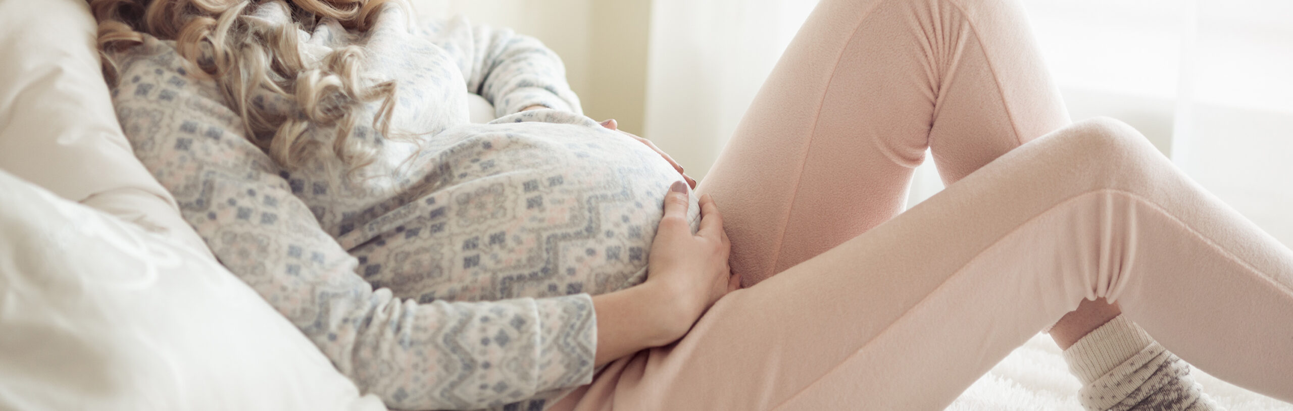 Beautiful Pregnant Woman In Cozy Clothes.